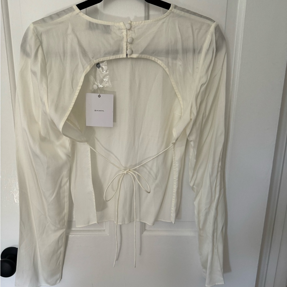 SOLD.  NWT L’academie the Anya Top in Ivory size S